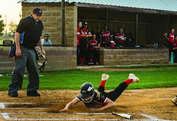 Aspermont junior Mylee Van Meter slides into home plate to score the only run for the Lady Hornets last Thursday against Eula. The Lady Hornets fell to the Lady Pirates in a best-ofthree bi district round in Hawley; 15-0 in game 1, followed by 15-1 in game 2. They finish with an overall record of 4-5 (4-3 District). PHOTO BY: MARK MARTINEZ
